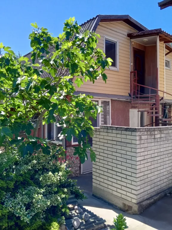 Деревянная мансарда с балконом