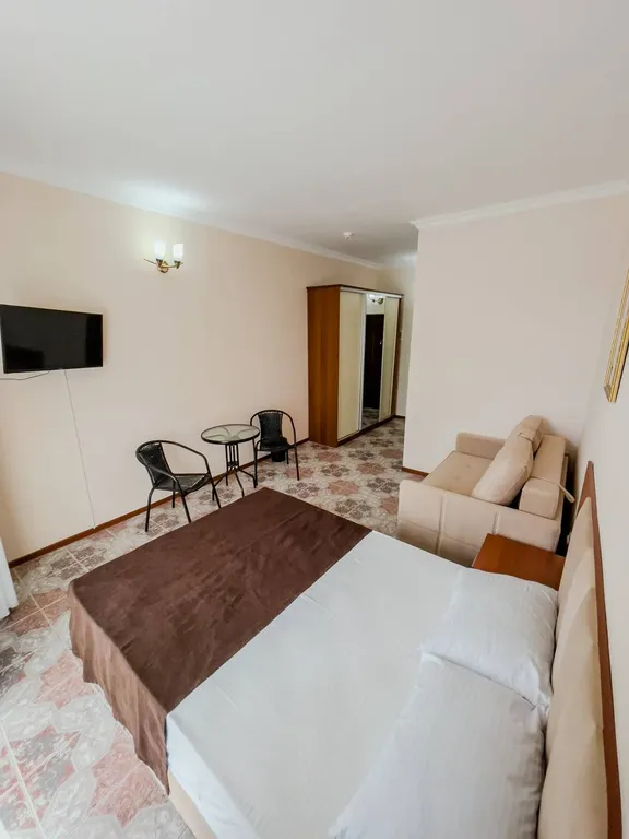 Трехместный номер с балконом