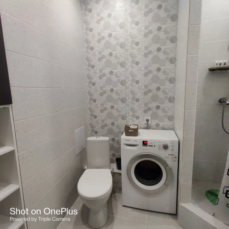 Дизайнерская и просторная квартира недалеко от центра