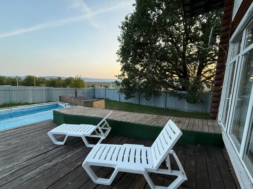 Срубовой дом с большим бассейном и шикарным видом на Жигулевские горы