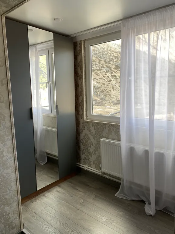 Стильная однушка с видом на горы