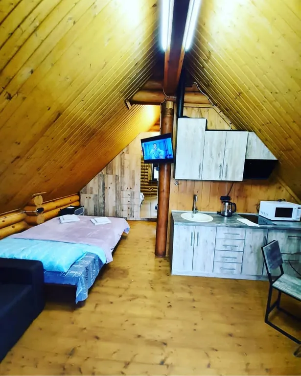 Квартира Мансардная квартира-студия в доме из сруба — Севастополь