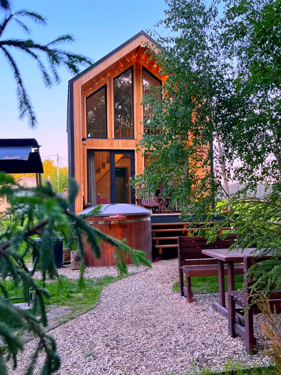 Дом с купелью на берегу реки