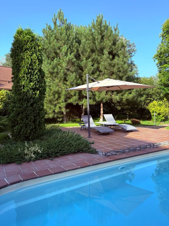 Дом в горах на берегу реки