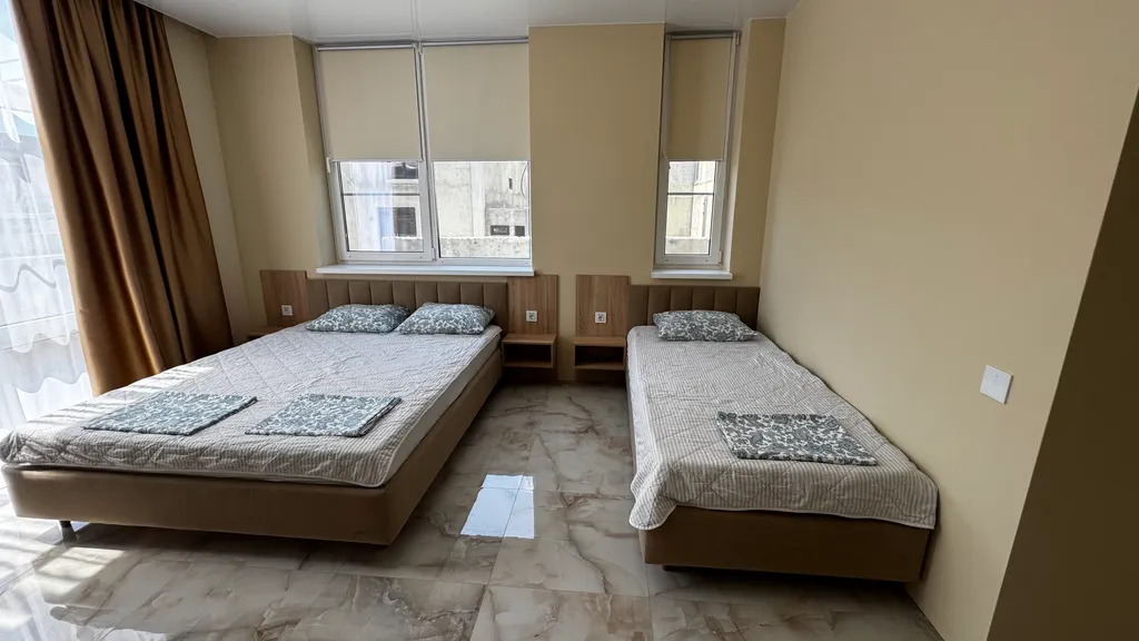 Квартира Квартира Просторный семейный номер в совершенно новом гостевом доме — Сочи