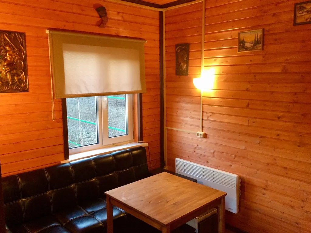 Уютный домик у леса с камином и сауной.