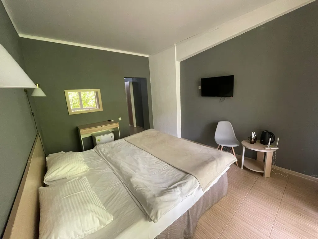 Квартира Квартира Уютный номер на 1 этаже с видом на парк с балконом. — Гагра