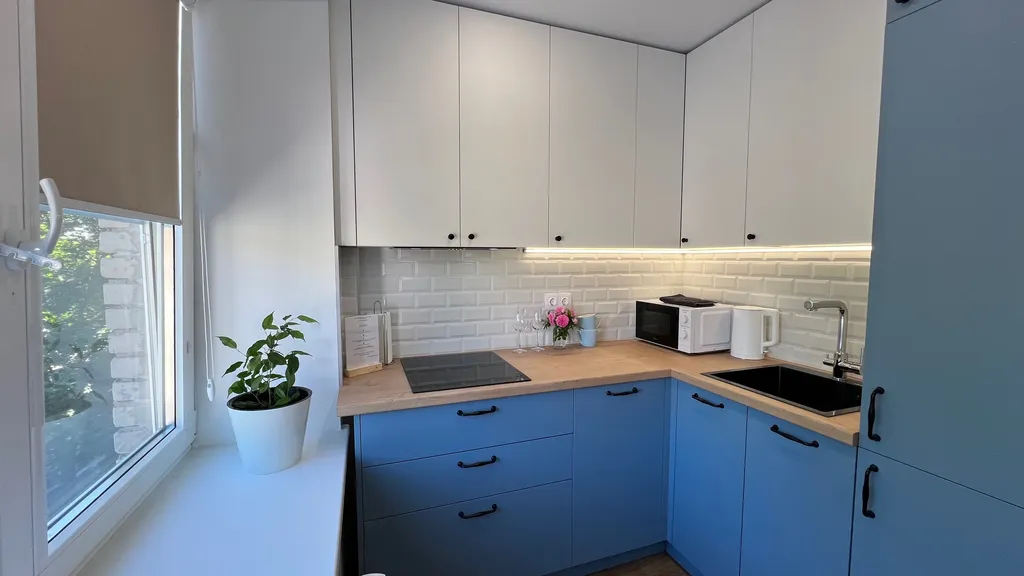 Апартамент у часовой башни и дома гильдии