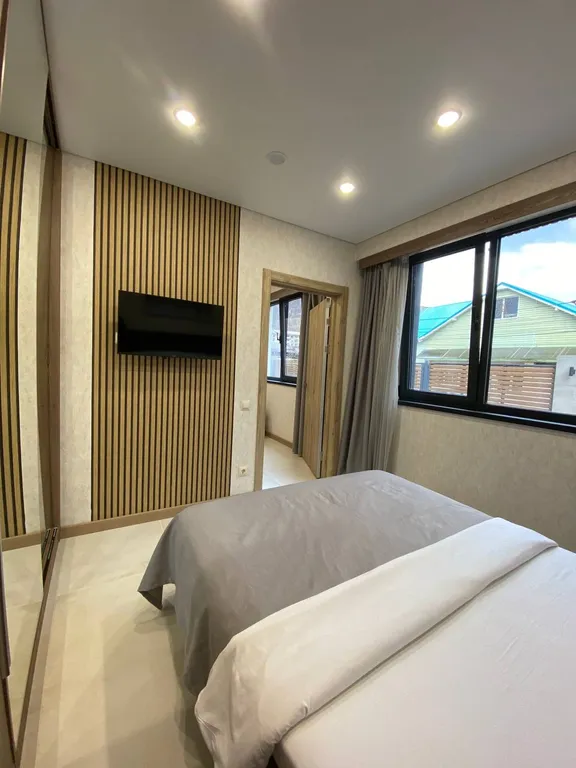 Апартаменты с собственной парковкой вблизи подъемника Горная Карусель