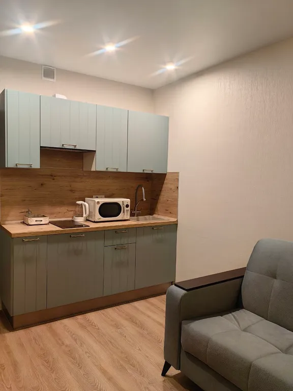 Комфopтнaя студия на 25 этаже