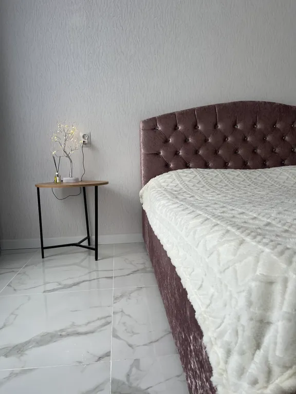 Светлая и уютная квартира с высокими потолками