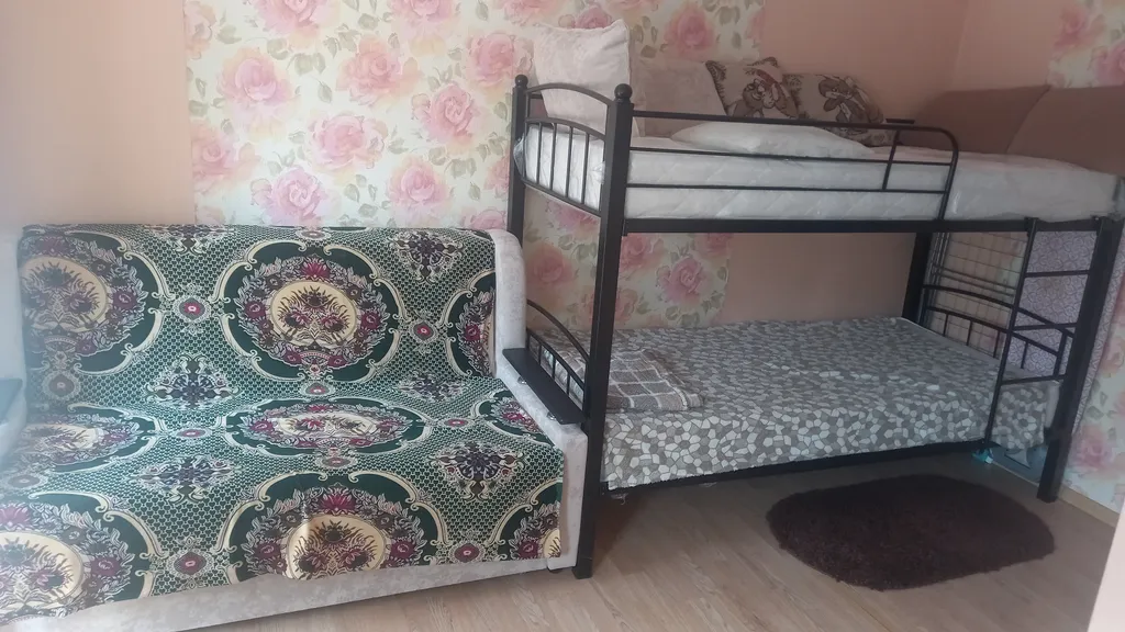 Уютная комната-студия в центре города с цветущим двориком с фонтанчиками