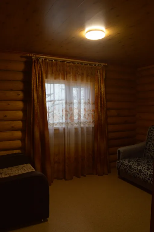 Домик из сосны в городе  С.