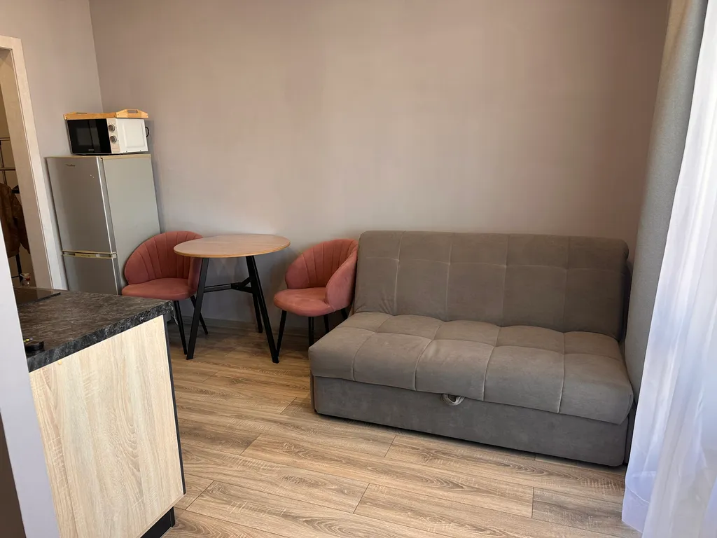 Уютная студия с видом на город