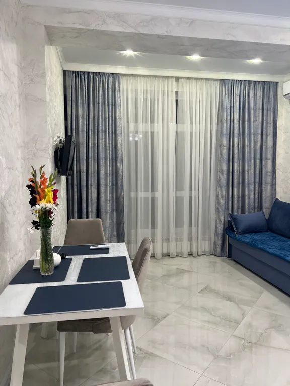 Уютная квартира в центре города с видом на горы