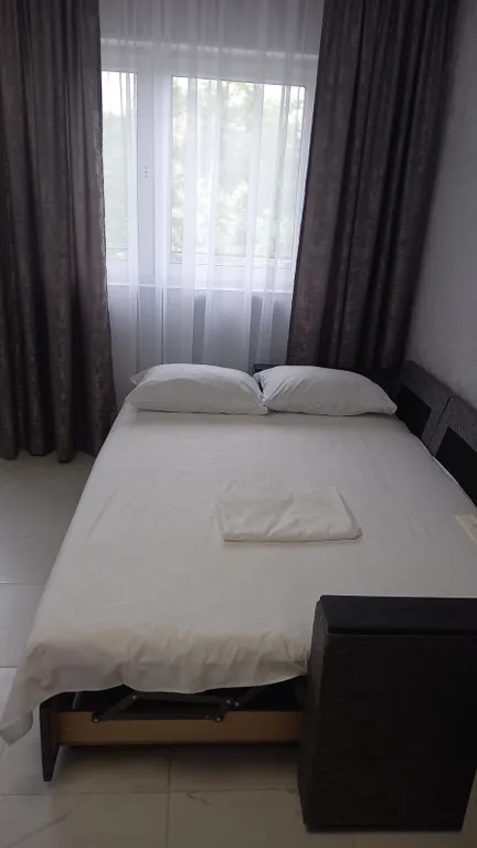 Уютная студия с видом на море и город