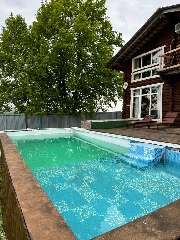 Срубовой дом с большим бассейном и шикарным видом на Жигулевские горы