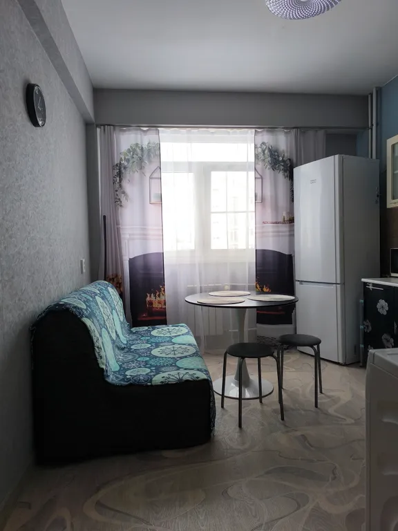 Квартира с балконом и видом на горы