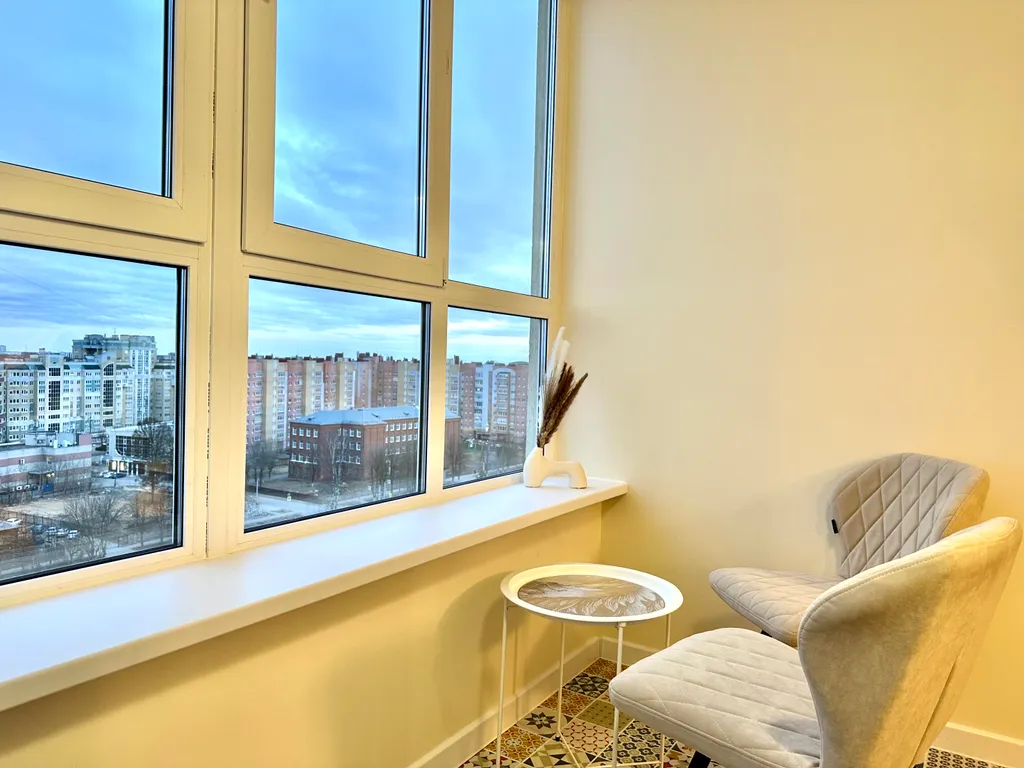 Светлые современные апартаменты в центре города