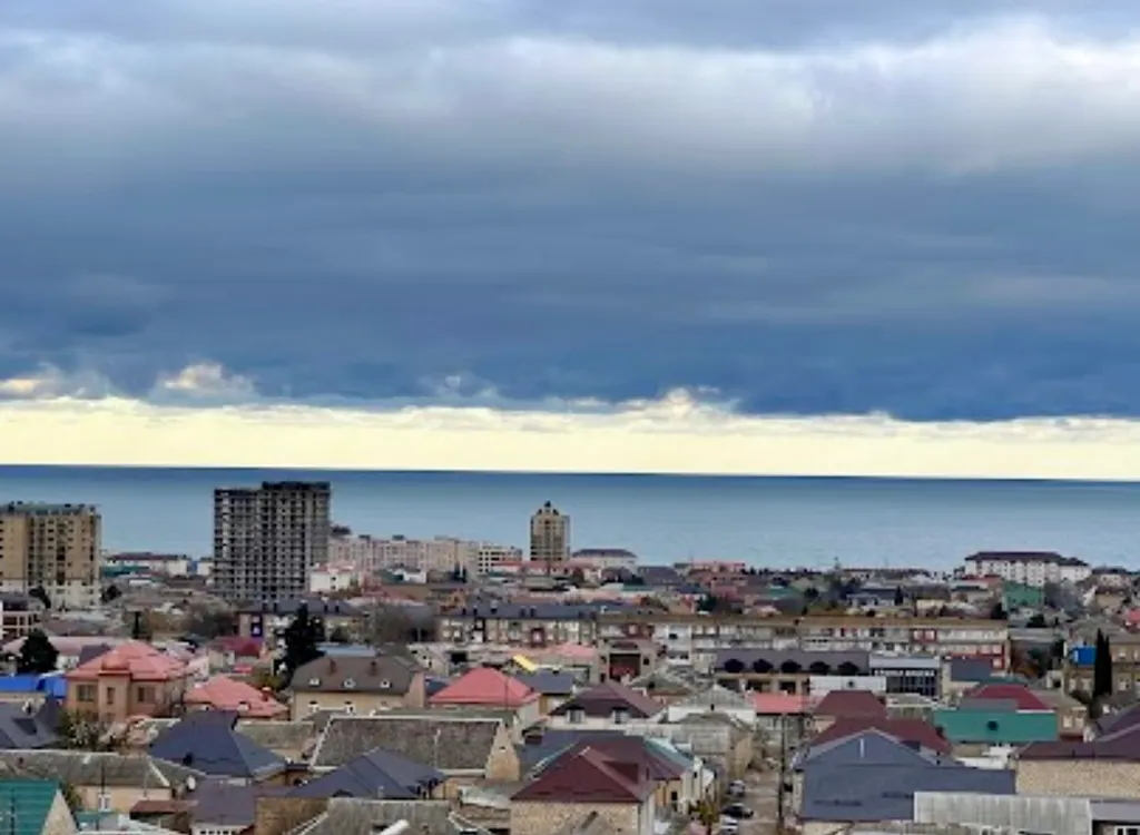 Уютный гостевой дом с видом на город и море