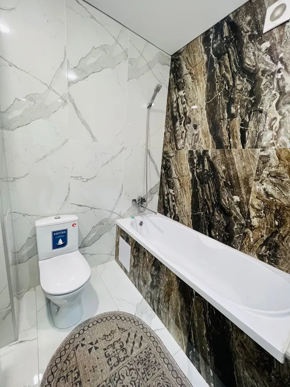 Шикарный вип с дизайнерским ремонтом в центре Алматы