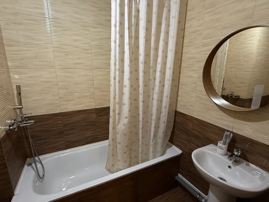 Уютная квартира с роскошной кроватью