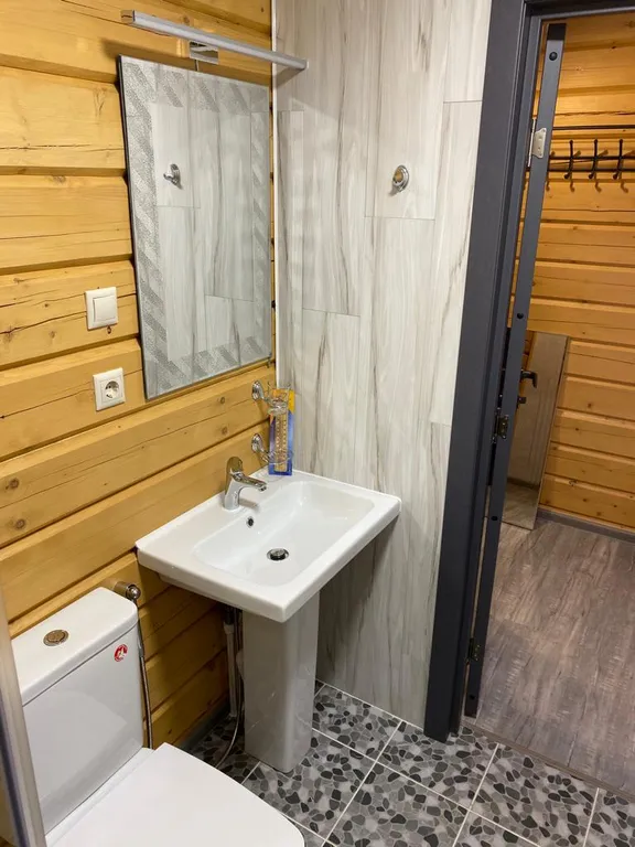 Усадьба в лесу с видом на горы