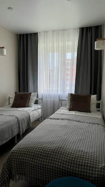 Уютная евротрешка с большой гостиной и двумя изолированными спальнями