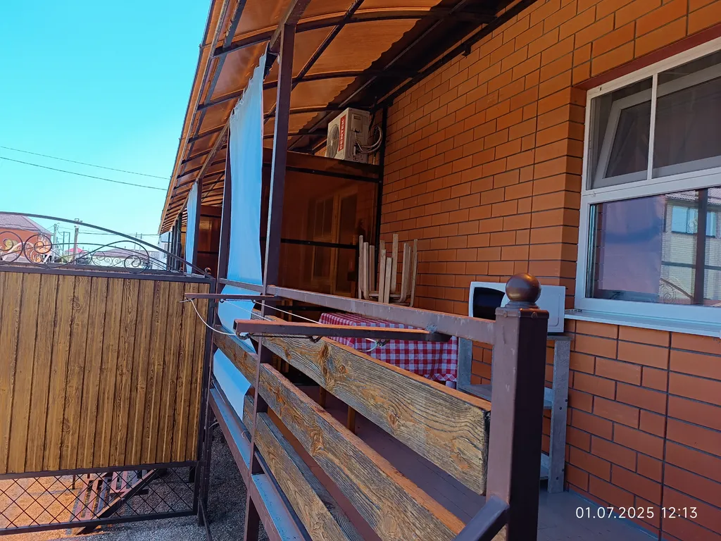 Номер со своим двором и общей кухней