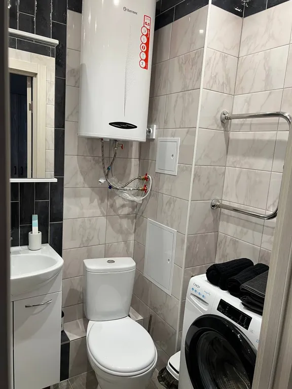 Светлая стильная студия в новом доме