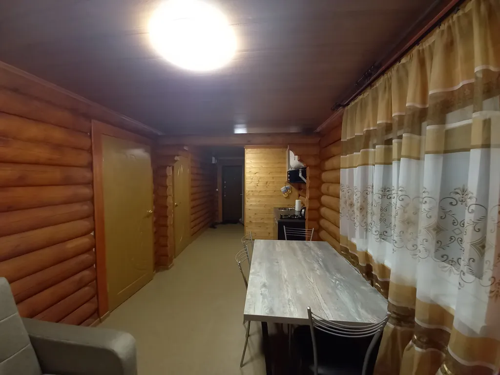 Домик из сосны в городе  С.