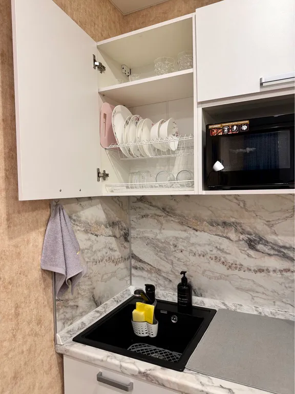 Современная студия в бежевых тонах в Люберцах