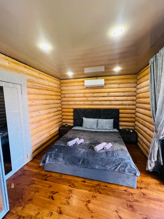 Семейные апартаменты Балдино в доме из сруба