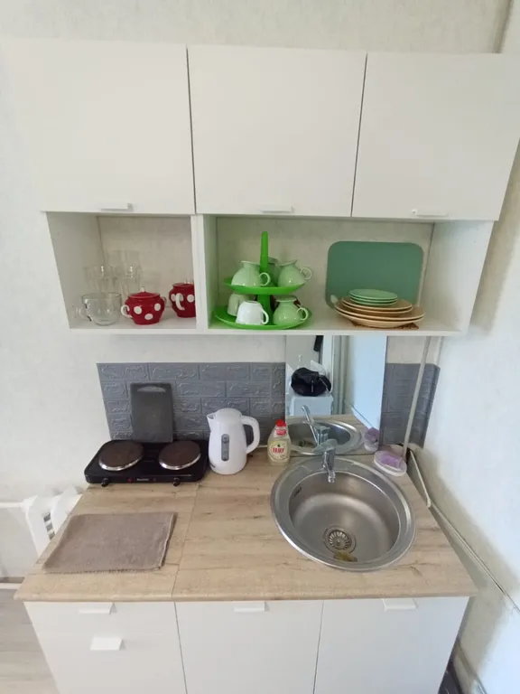 Комната-студия в общежитии в центре города.