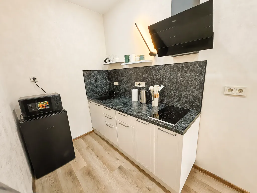 Уютные апартаменты с видом на лес и набережной у дома