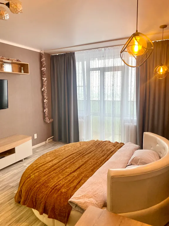 Пентхаус с видом на город. Круглая кровать+ диван