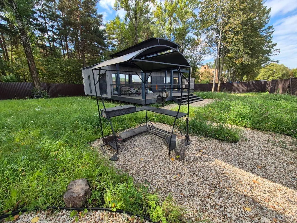 Новый стильный дом с купелью и сауной