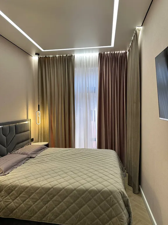 Двухэтажные апартаменты в центре города