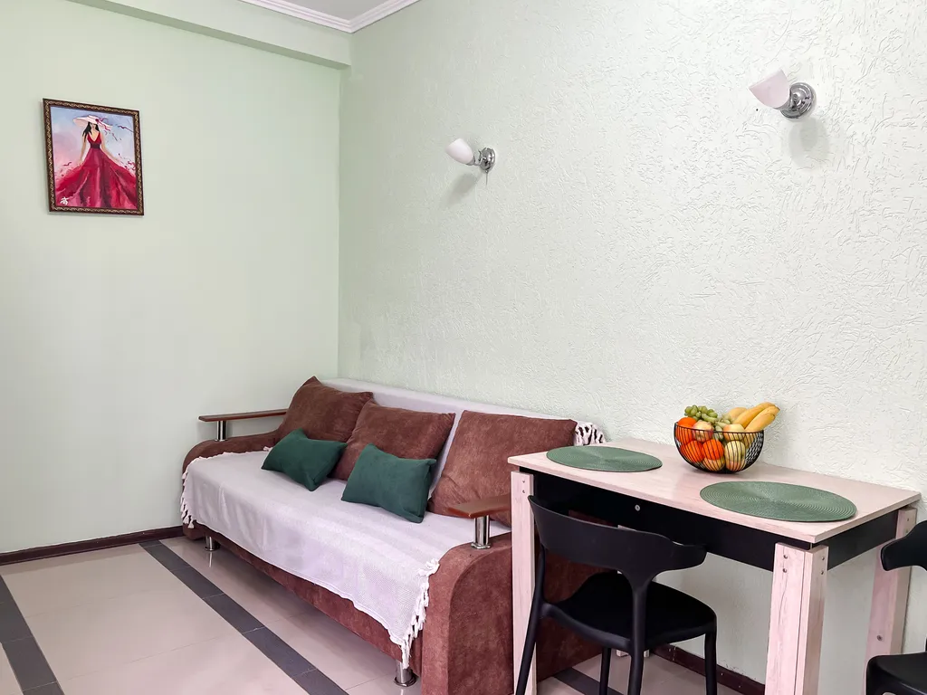 Семейный номер с кухней в центре