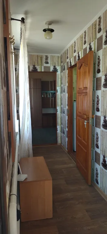 Небольшой гостевой дом со встроенной кухней на берегу моря