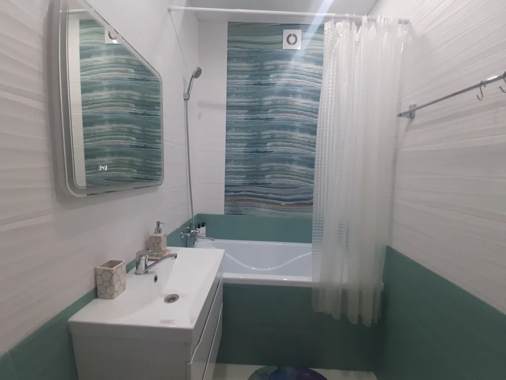 Уютная студия с видом на колесо обозрения