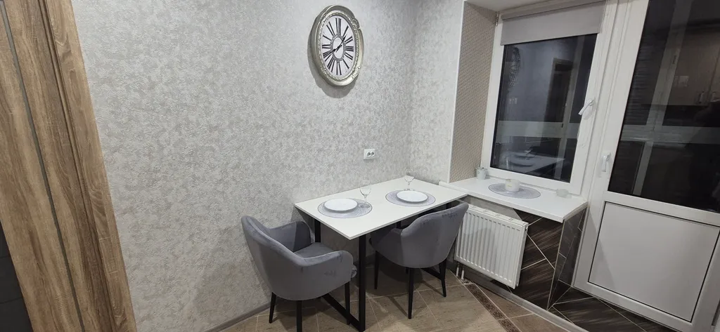 Уютная квартира в центре города с видом на колесо обозрения