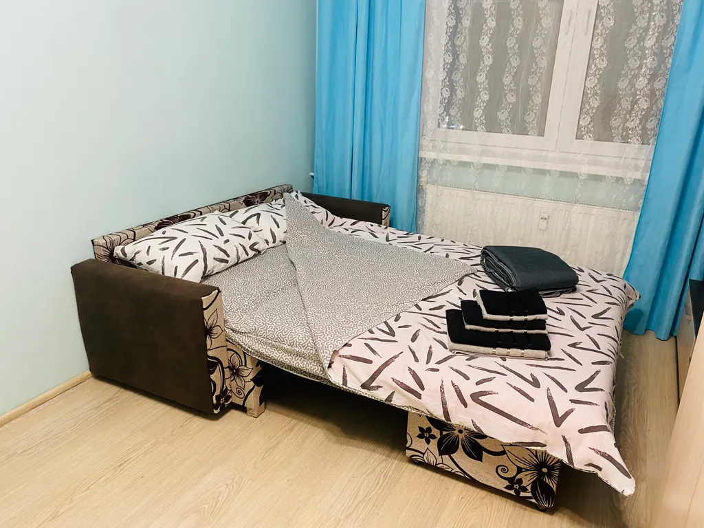 Уютная квартира с прекрасным видом на город в огнях