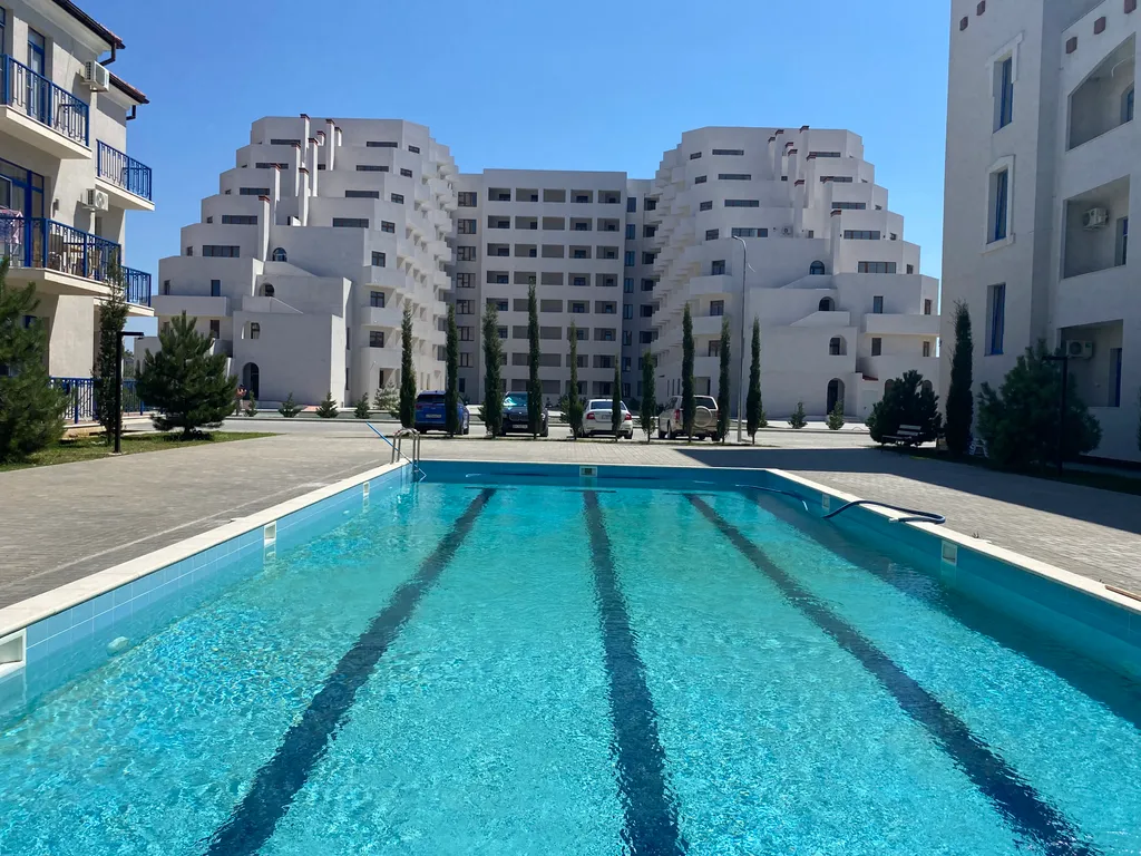 Студия рядом с песочным пляжем и бассейном