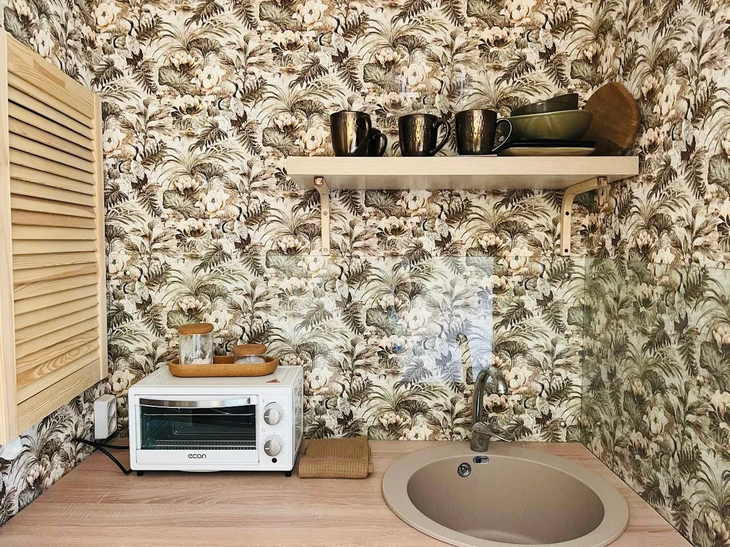 Уютная студия с выходом в сад