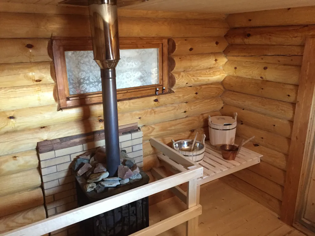 Дом из бревна Терем с сауной в черте города