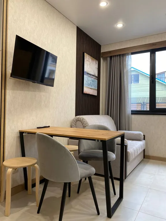 Апартаменты с собственной парковкой вблизи подъемника Горная Карусель