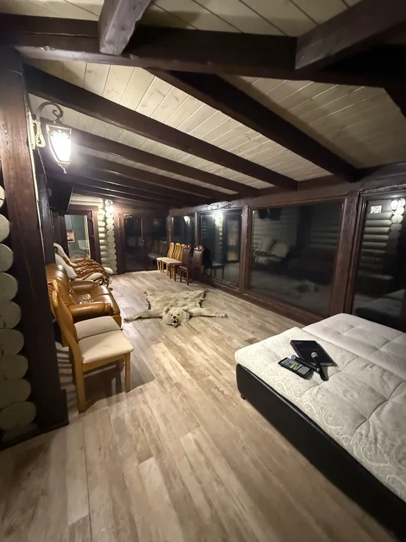 Двухэтажный дом из сруба а Теберде с баней с видом на горы и реку