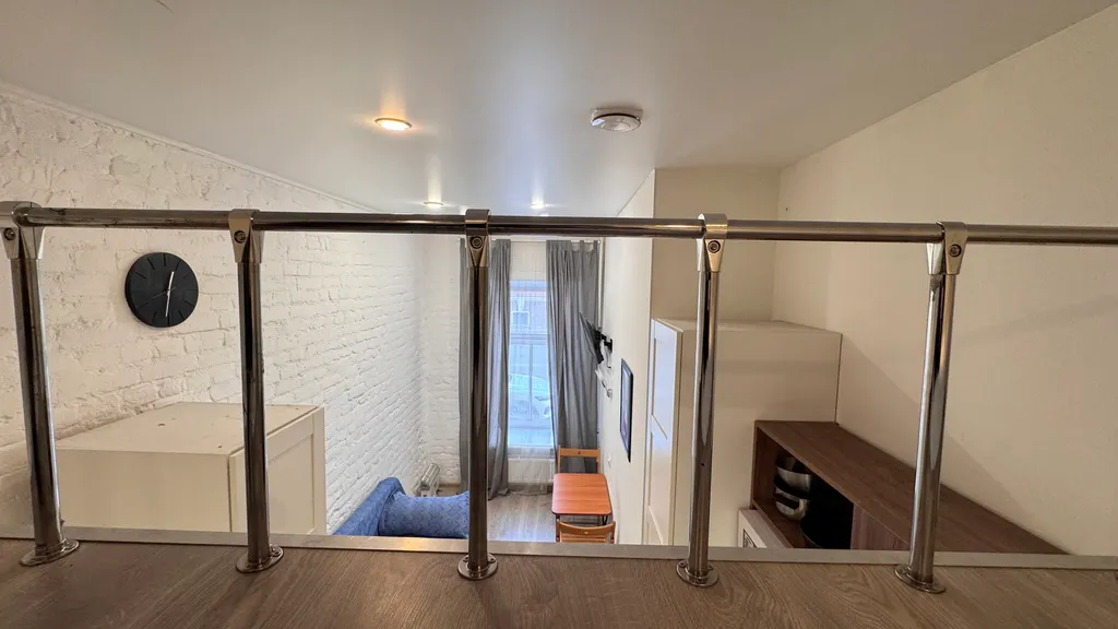 Двухуровневая квартира-студия в центре города