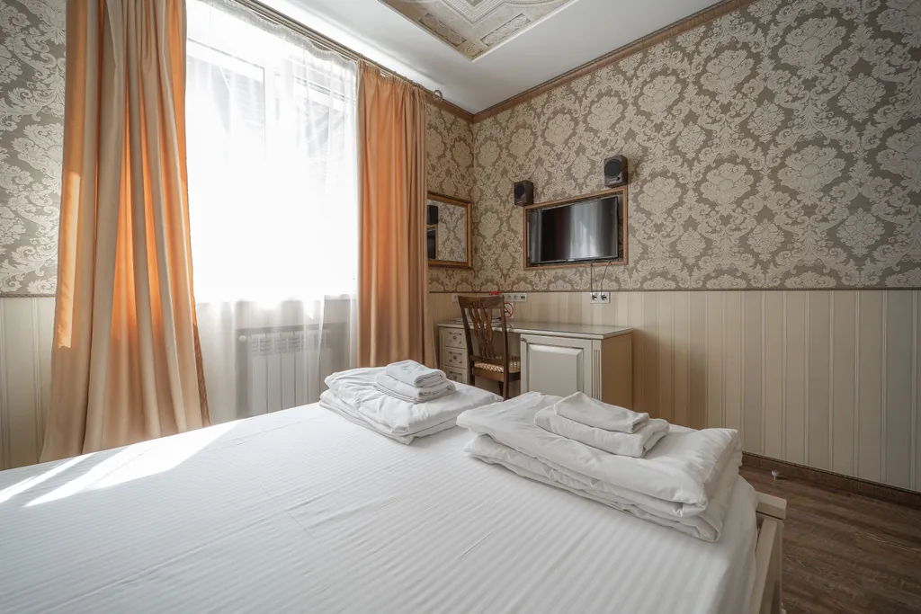 Двухместная комната с двуспальной кроватью НР